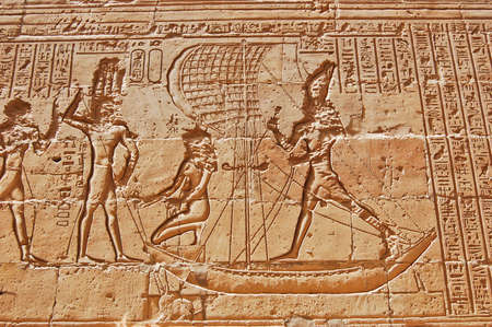 Egyptian carving on wall in Edfu temple, Egyptの写真素材
