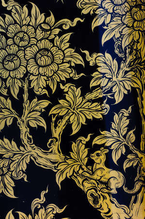 Tradition Thai floral on temple door, Thailandのeditorial素材