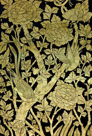 Traditional Thai art on temple door, Thailandのeditorial素材