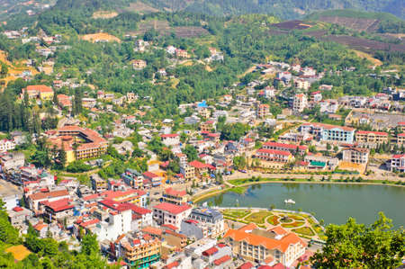 Sapa lake and town in green valley, Vietnamの写真素材