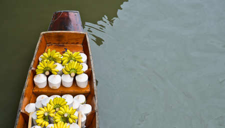 Tropical fruits for sale on floating marketの写真素材