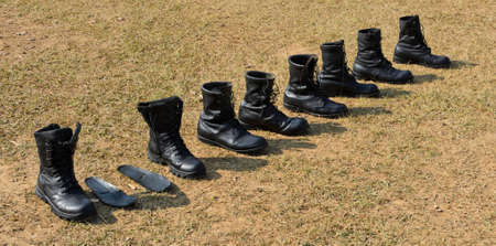 Row of military bootsの写真素材