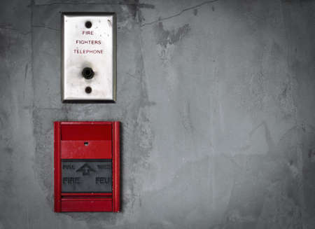 Wall mounted fire alarm and fire fighters telephoneの写真素材
