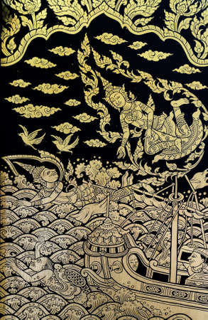 Thai gold leaf painting  art on temple doorの写真素材