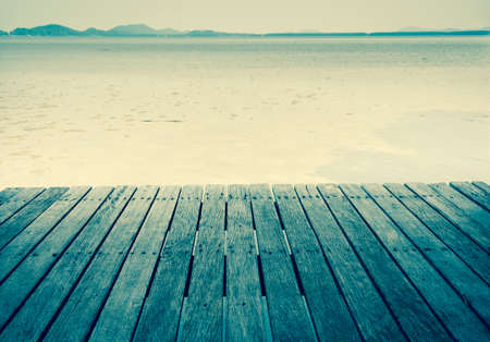 Seaside wooden bridge in vintage styleの写真素材