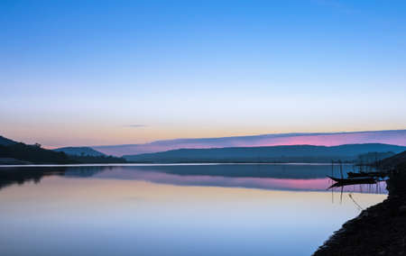 Beautiful sunrise with reflection on the river