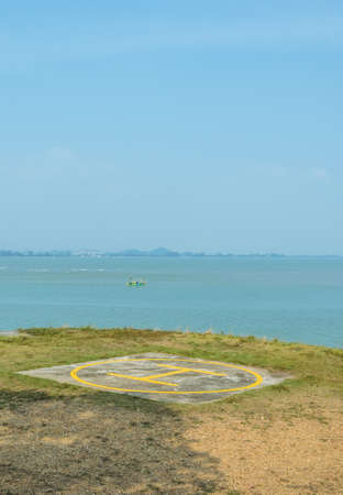 Helicopter pad on the sea shoreの写真素材