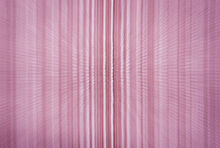 Abstract pink fabric with zoom burstの写真素材
