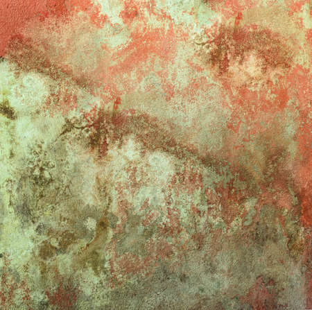 Wall texture background of weathered red paint peeling off 