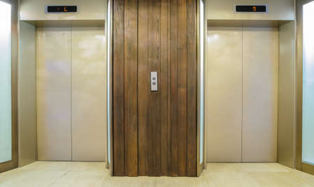 Two elevators with closed doorの写真素材