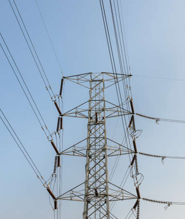 Electricity pylon or transmission tower in blue skyの写真素材