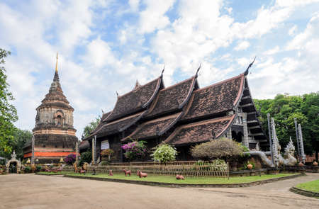 Thai Lanna wooden monastery and pagoda at Wat Lok Moli in Chiang Mai, Thailandの写真素材