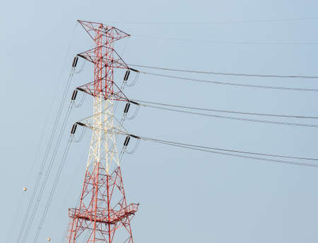 Electricity pylon or transmission tower in blue sky