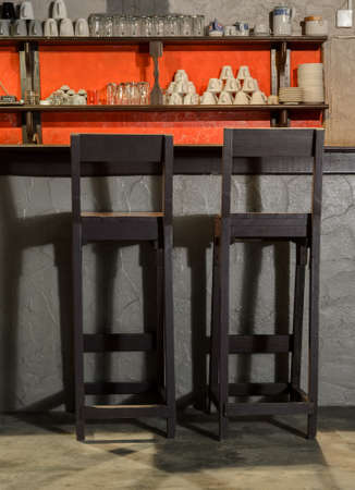 Bar stool with shadow at nightの写真素材