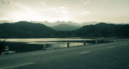 Reservoir with mountain view in vintage style colorの写真素材