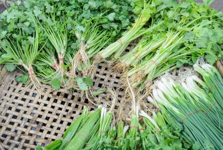 Bundle of fresh vegetables on street market in Thailandの写真素材
