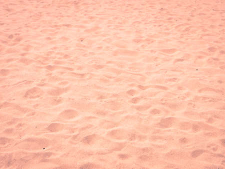 Sand beach texture background in vintage style colorの写真素材