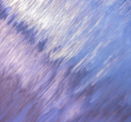 Blurred abstract background of light reflection on water motionの写真素材