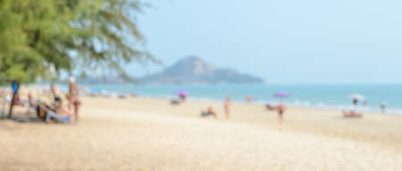 Blur sea image background of people on the beachの写真素材