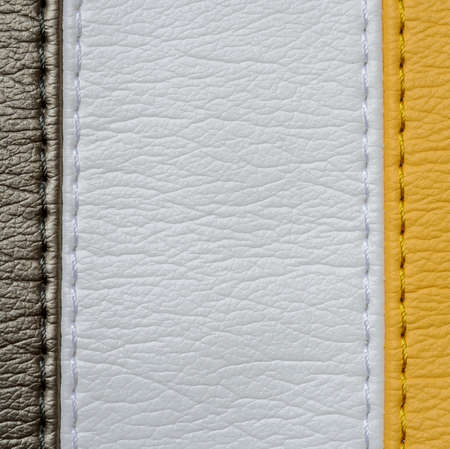Yellow brown and white leather texture background with stitchの写真素材