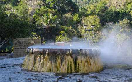 RANONG, THAILAND - FEBRUARY 20, 2015. Hot springs pool at Raksawarin Public Park in Ranong, Thailand. Temperature of the water in the natural spring pool about 65 C.の写真素材
