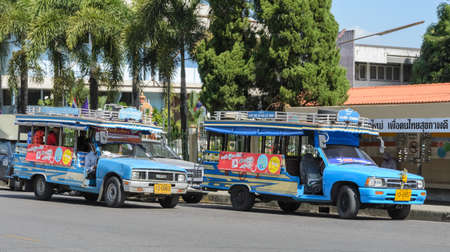 RANONG , THAILAND - FEBRUARY 20, 2015 : Public transport of wooden minibus or Songtaew in Ranong, Thailand.のeditorial素材