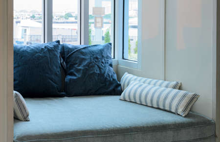 Living room with  cushions and glass window