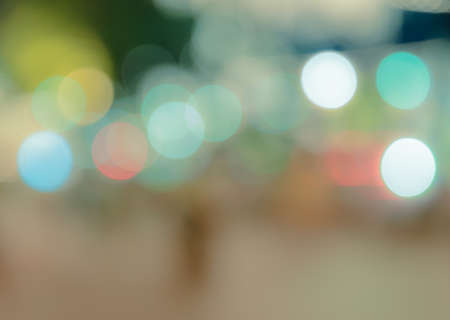 Colorful bokeh background of city lights illuminated at nightの写真素材
