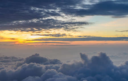 Dramatic sky of rising sun in the early morning over sea of mist
