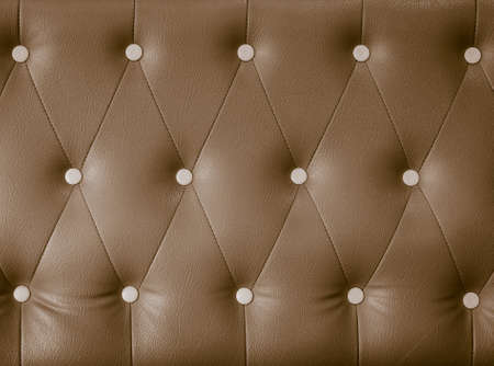 Brown leather sofa pattern texture backgroundの写真素材