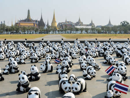BANGKOK, THAILAND - MARCH 4, 2016: Exhibition of the 1,600 paper-mache panda sculptures world tour collaboration between WWF and French artist Paulo Grangeon at Sanam Luang in Bangkok, Thailand.のeditorial素材