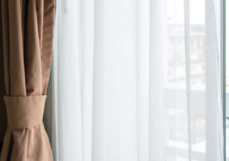 Glass window with translucent curtainの写真素材