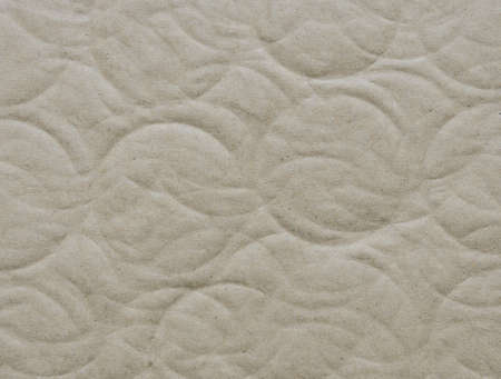 Recycled corrugated cardboard paper texture background with debossed circle shape