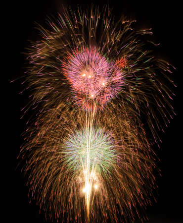 Colorful fireworks on night sky background