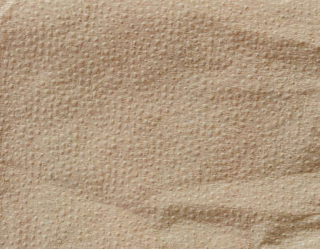 Recycled brown tissue paper texture backgroundの写真素材