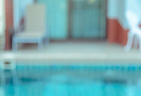 Abstract blurred image of outdoor swimming pool for backgroundの写真素材
