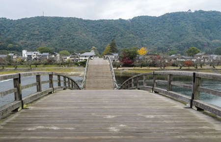 Kintai Bridge over Nishiki river in cloudy day, Iwakuni, Japanの写真素材