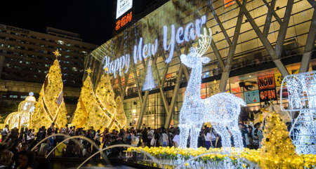 BANGKOK, THAILAND - DECEMBER 22, 2016 : Night illumination of Christmas and New Year celebration 2017 at Central World shopping mall, Ratchaprasong intersection in Bangkok, Thailand.のeditorial素材