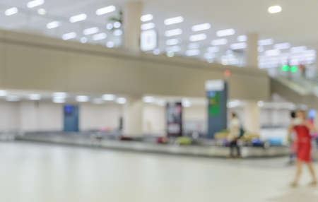 Blurred image of  baggage carousel in airport arrival terminalの写真素材