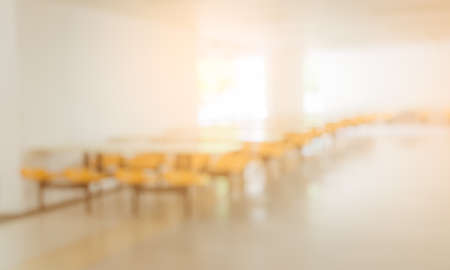 Abstract blur interior cafeteria or canteen with empty chairs and tables