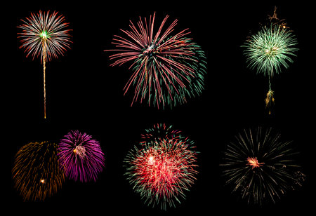 Variety of colorful six fireworks isolated on black backgroundの写真素材