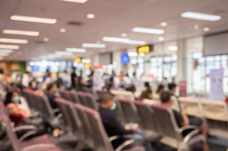 Abstract blurred background of Passengers waiting at airport boarding areaの写真素材