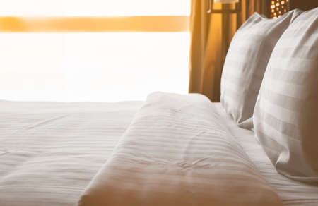 Bedroom with bed and white linen