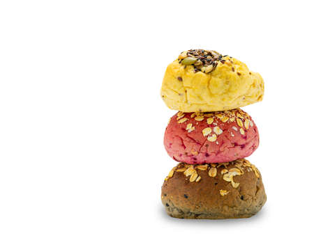 Stack of homemade veggie burger whole wheat buns bread of pumpkin, beetroot and black sesame with cereal and sesame seeds isolated on white backgroundの写真素材