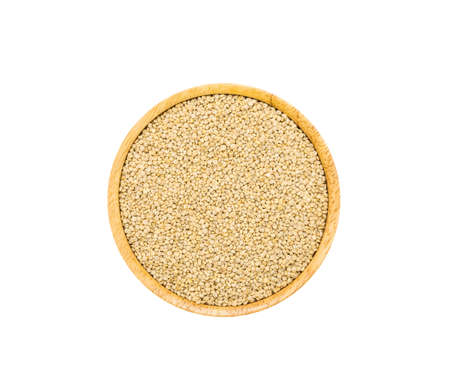 White quinoa seeds in wooden brown bowl isolated on white background, top view. Healthy organic super food conceptの写真素材