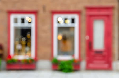 Blurred abstract image of window shop display or cafe with bokeh lights backgroundの写真素材