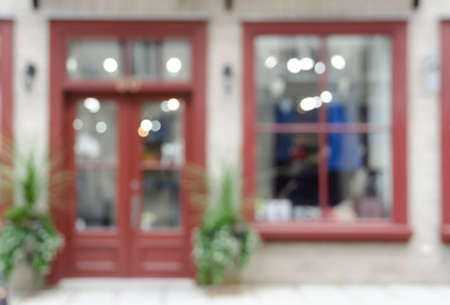 Blurred abstract image of window shop display or cafe with bokeh lights backgroundの写真素材