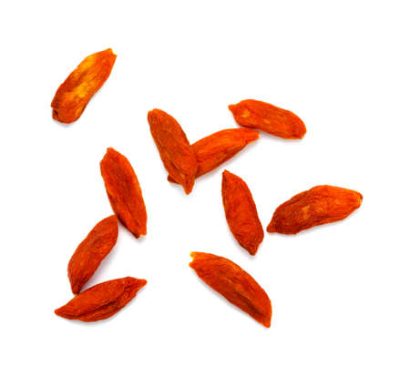 Dried Goji Berries or Chinese wolfberries isolated on white backgroundの写真素材