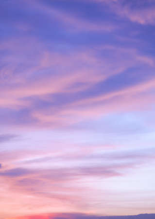 Dramatic sunset sky and clouds at twilight skyline backgroundの写真素材