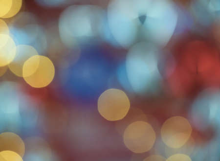 Abstract bokeh colorful light celebration background with de- focused lightsの写真素材